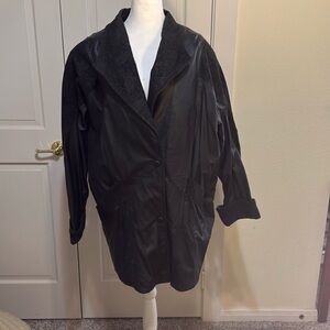 Black leather coat from Wilson’s. Size large.